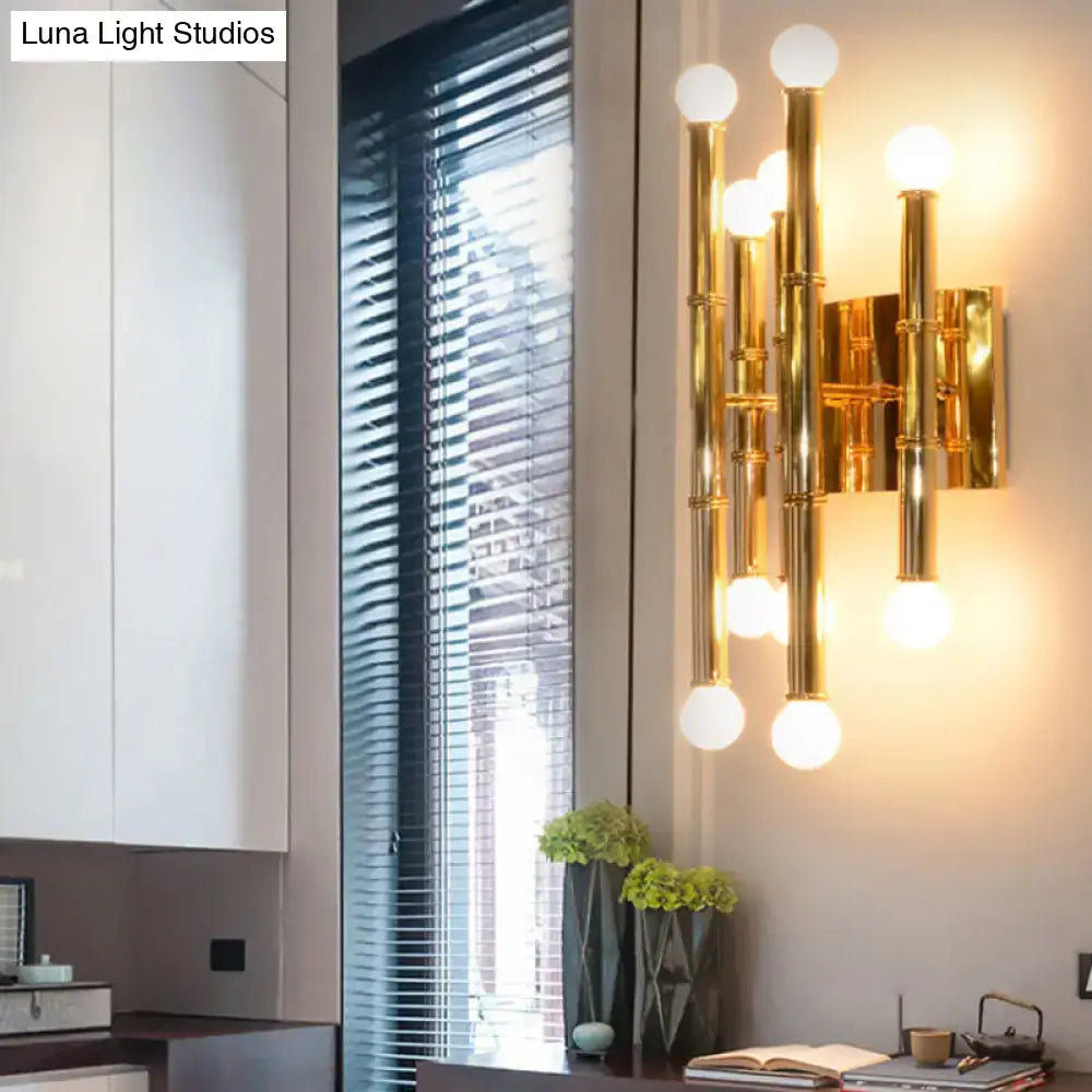 Decorbites gold bamboo wall sconce with globe bulbs in brass finish on Tampa Home & Garden Store