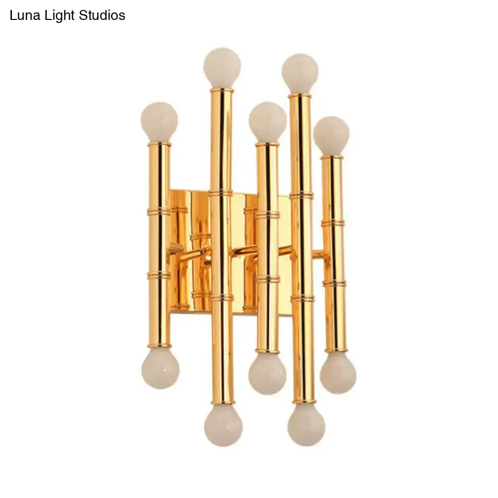 Gold Bamboo Wall Sconce with multiple vertical rods and white globe bulbs on Tampa Home & Garden Store