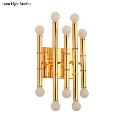 Gold Bamboo Wall Sconce with multiple vertical rods and white globe bulbs on Tampa Home & Garden Store