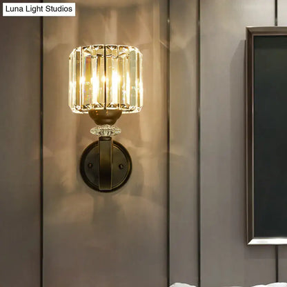 Black crystal prismatic wall sconce Decorbites with clear prisms and bronze mount on Tampa Home & Garden Store