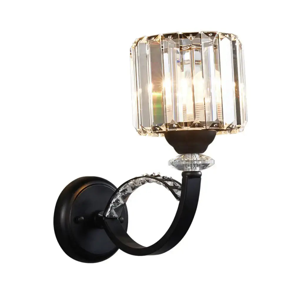 Black crystal prismatic wall sconce with curved black arm and crystal shade by Decorbites on Tampa Home & Garden Store