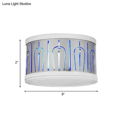 Peacock LED Wall Lamp with silver metal shade and blue light accents 8in diameter on Tampa Home & Garden Store