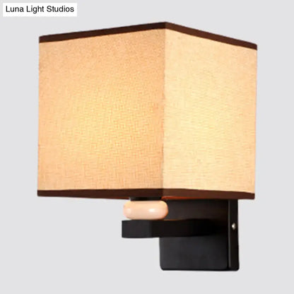 Fabric Rectangle Wall Light with beige fabric shade and dark brown trim on black wall mount on Tampa Home & Garden Store