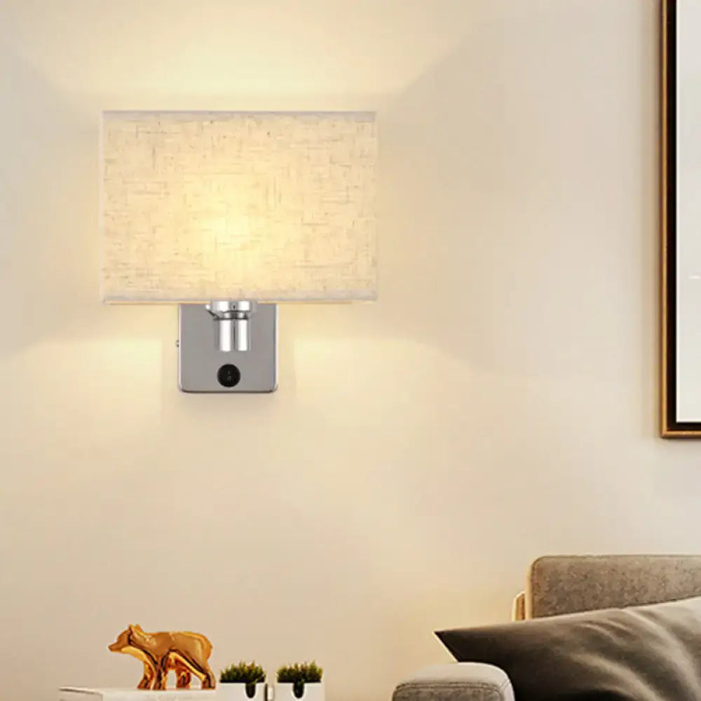 Chrome fabric oval shade wall sconce by Decorbites with square base warm light on Tampa Home & Garden Store