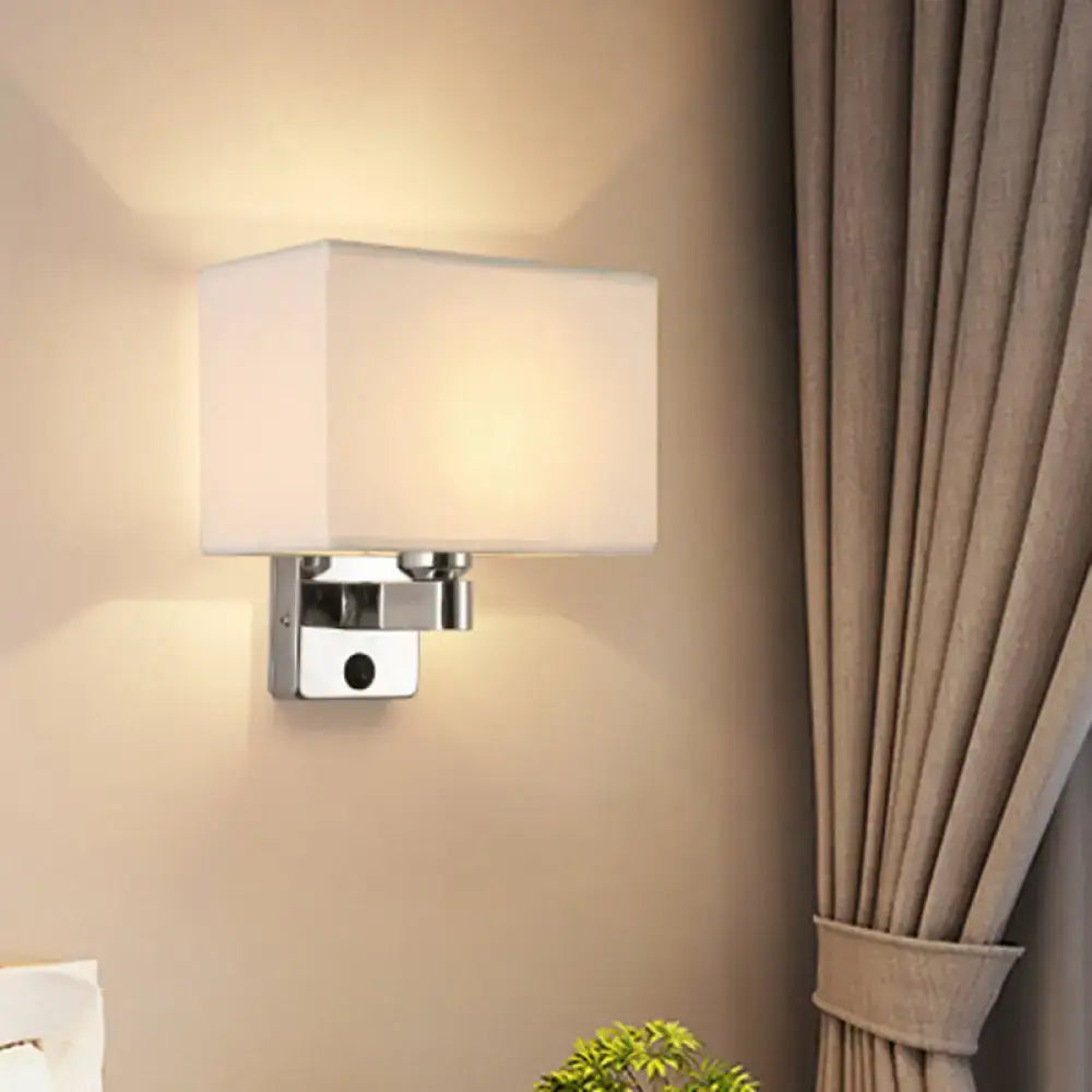 Decorbites chrome fabric oval shade wall sconce with white fabric shade on Tampa Home & Garden Store