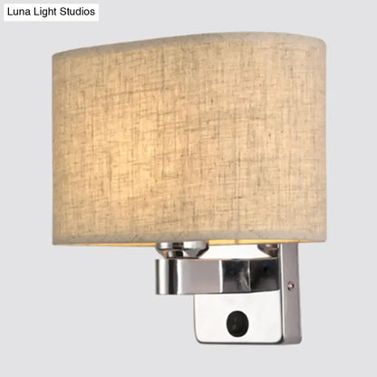 Chrome Fabric Oval Shade Wall Sconce by Decorbites; chrome mount with beige linen shade on Tampa Home & Garden Store