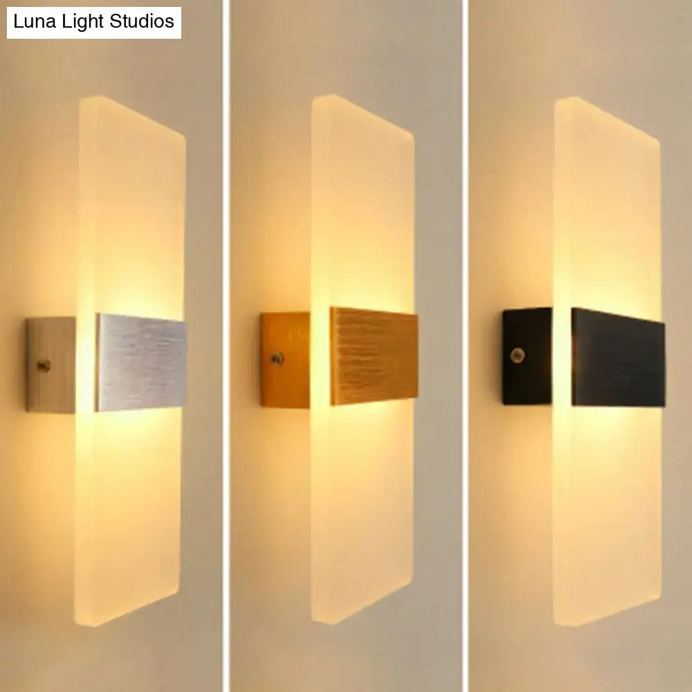 Frosted LED wall sconce by Decorbites with frosted panel in silver, wood or black finishes on Tampa Home & Garden Store
