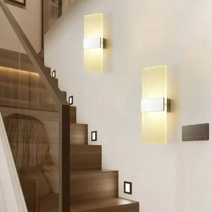 Frosted LED Wall Sconce by Decorbites, frosted glass with metal band, warm white glow on stairs on Tampa Home & Garden Store