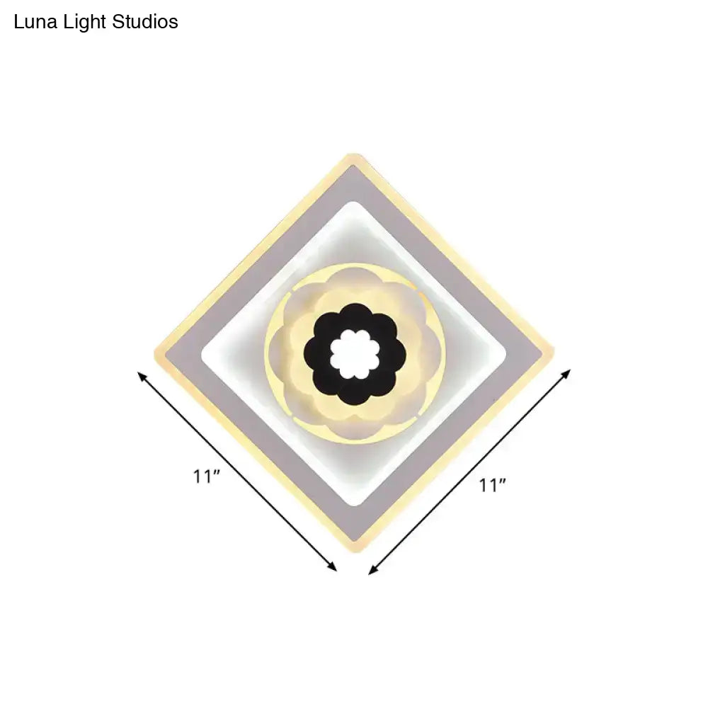 White Black Rhombus Sconce by Decorbites with gold diamond frames and black floral center 11in on Tampa Home & Garden Store