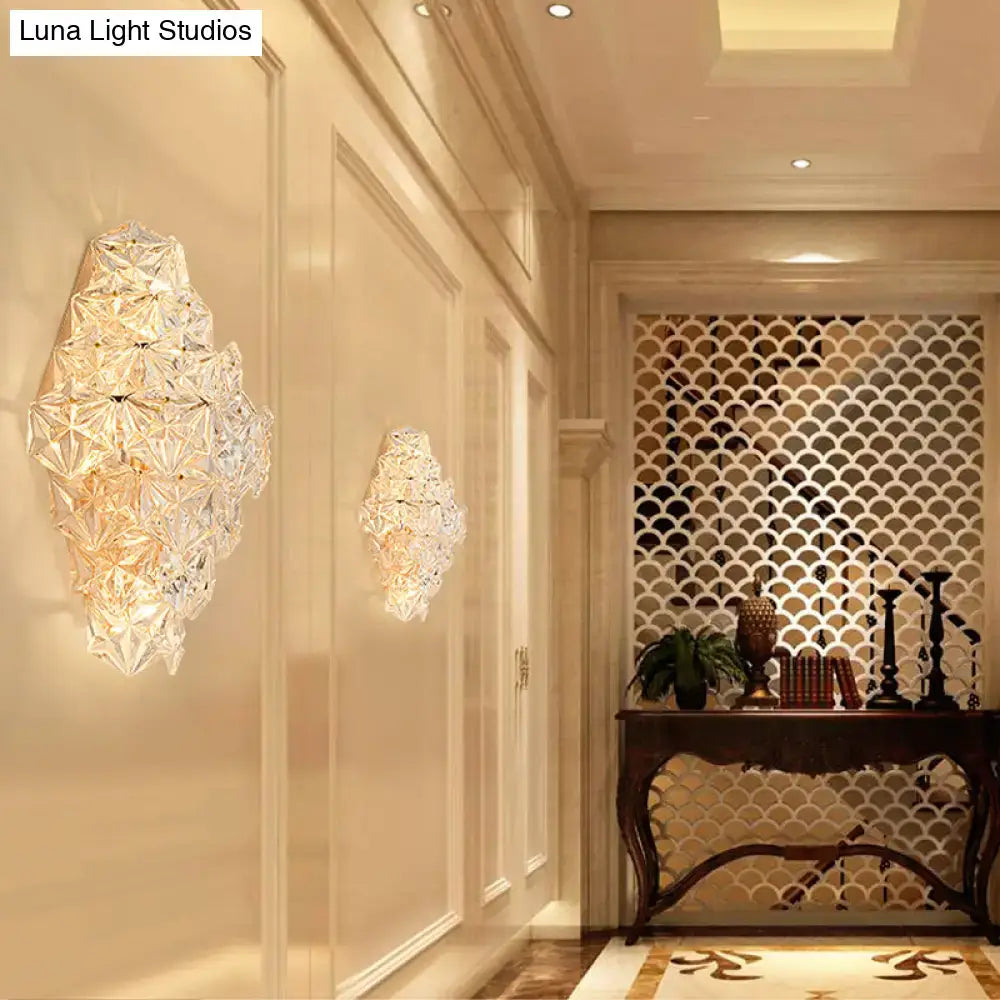 Clear crystal wall sconce, direct-wired modern, pair of diamond clusters in warm hallway light on Tampa Home & Garden Store