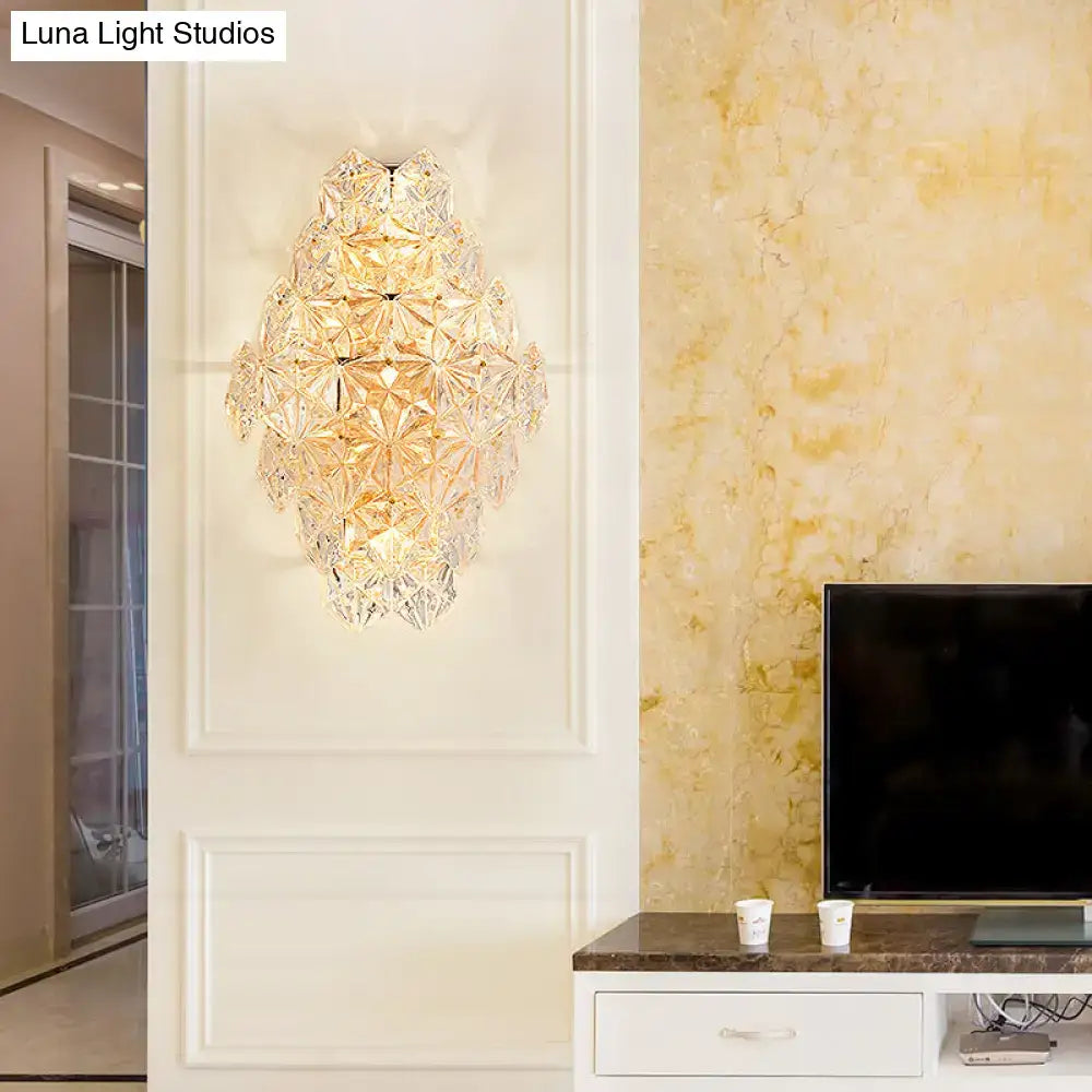 Clear Crystal Wall Sconce Direct-Wired Modern Decorbites with crystal prisms on a white wall on Tampa Home & Garden Store
