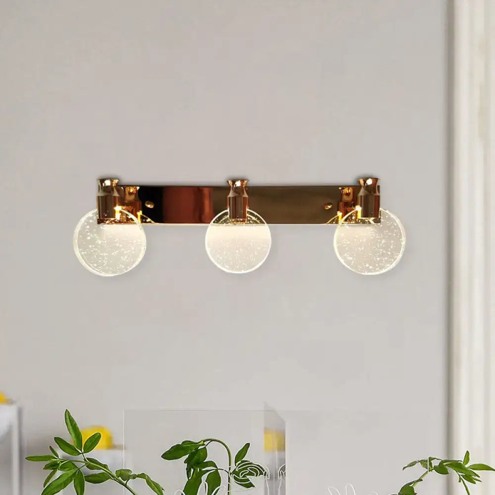Rose Gold Globe Vanity light bar with three clear speckled glass globes Decorbites on Tampa Home & Garden Store