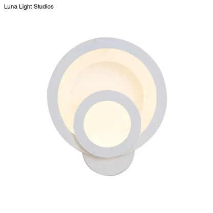 White LED Wall Light by Decorbites with overlapping circular rings and warm glow on Tampa Home & Garden Store