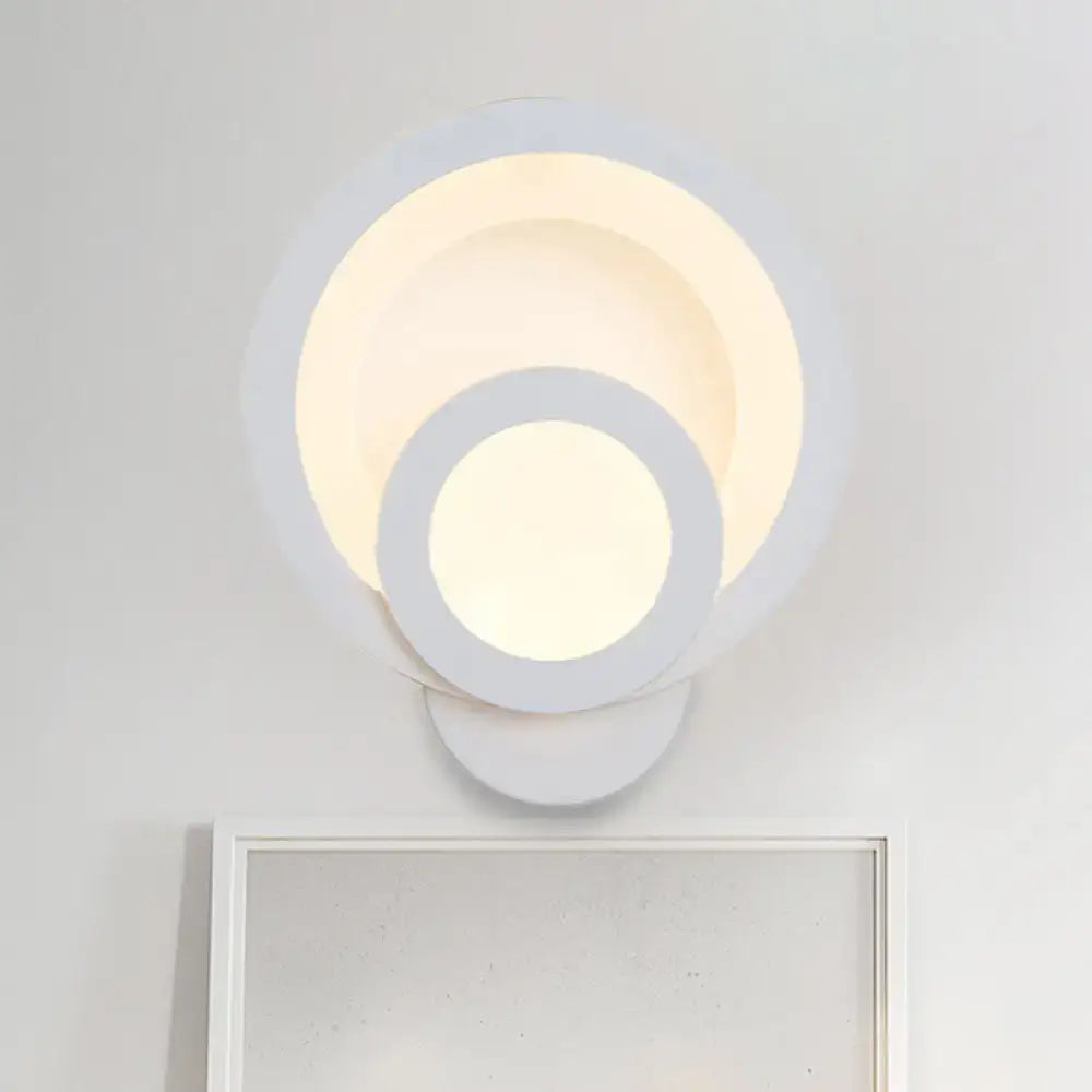White LED wall light Decorbites with layered circular rings and warm white glow on Tampa Home & Garden Store