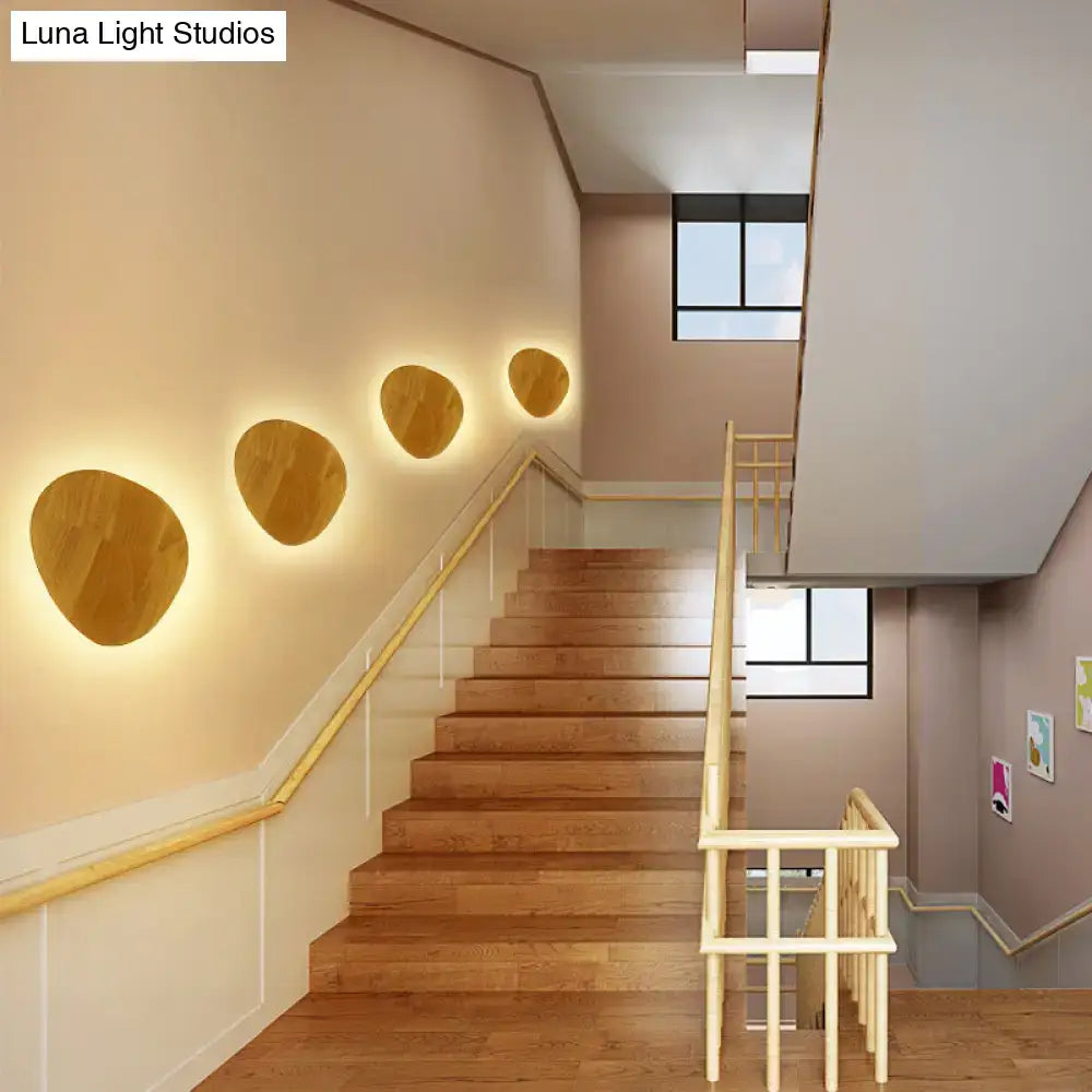 Wood LED Wall Lighting by Decorbites on a stair wall with wooden panels glowing warmly on Tampa Home & Garden Store