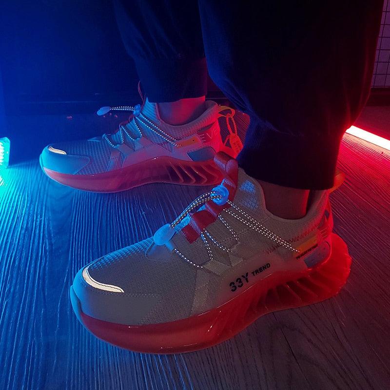 Stevvex athletic shoes for men with gray mesh upper, red chunky sole, reflective laces on Tampa Home & Garden Store