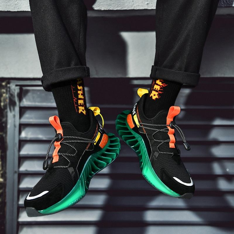 Stevvex men's athletic shoes pair, black mesh upper, neon-green sole, orange laces on Tampa Home & Garden Store