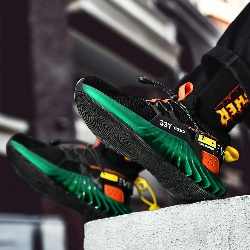 Stevvex running shoes pair with black mesh upper, green sole, orange accents on Tampa Home & Garden Store