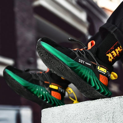 Stevvex running shoes pair with black mesh upper, green sole, orange accents on Tampa Home & Garden Store