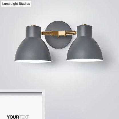 Decorbites Sage Gray Wall Sconce with dual matte gray shades and brass accent on Tampa Home & Garden Store