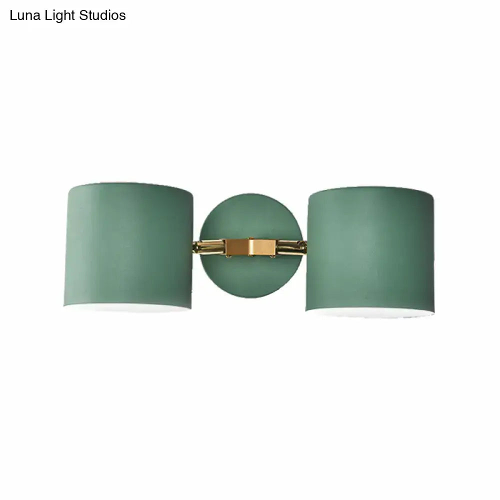 Sage Gray Wall Sconce by Decorbites with dual cylindrical sage-gray shades and brass mount on Tampa Home & Garden Store