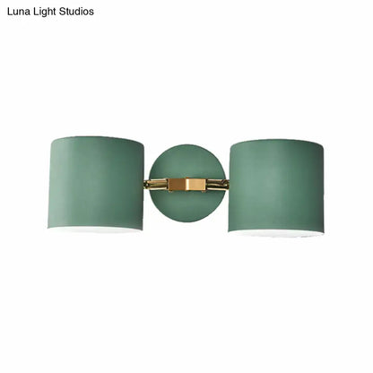Sage Gray Wall Sconce by Decorbites with dual cylindrical sage-gray shades and brass mount on Tampa Home & Garden Store