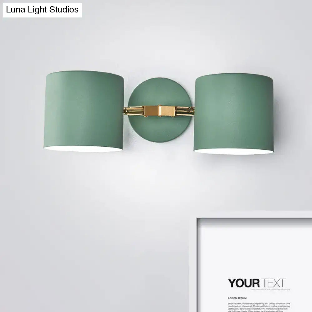 Sage Gray Wall Sconce by Decorbites featuring dual green drum shades and brass mount on Tampa Home & Garden Store