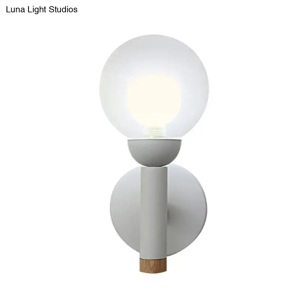 Sage Macaron Wall Sconce white glass globe on gray cylindrical body with cork accent on Tampa Home & Garden Store