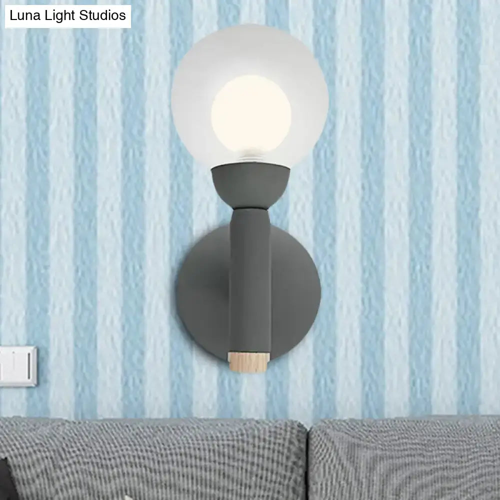 Decorbites Sage Macaron Wall Sconce, grey metal with frosted glass globe and backplate on Tampa Home & Garden Store