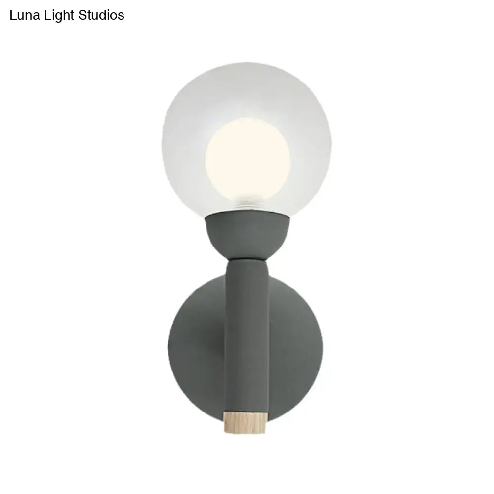 Sage Macaron Wall Sconce by Decorbites, gray metal with glass globe on Tampa Home & Garden Store