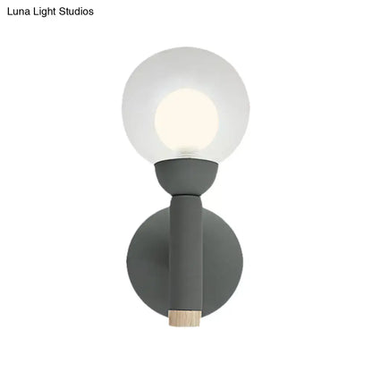 Sage Macaron Wall Sconce by Decorbites, gray metal with glass globe on Tampa Home & Garden Store