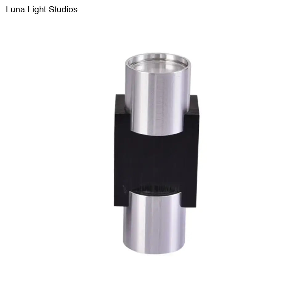 Decorbites silver aluminum wall light with twin cylindrical tubes and black central mount on Tampa Home & Garden Store