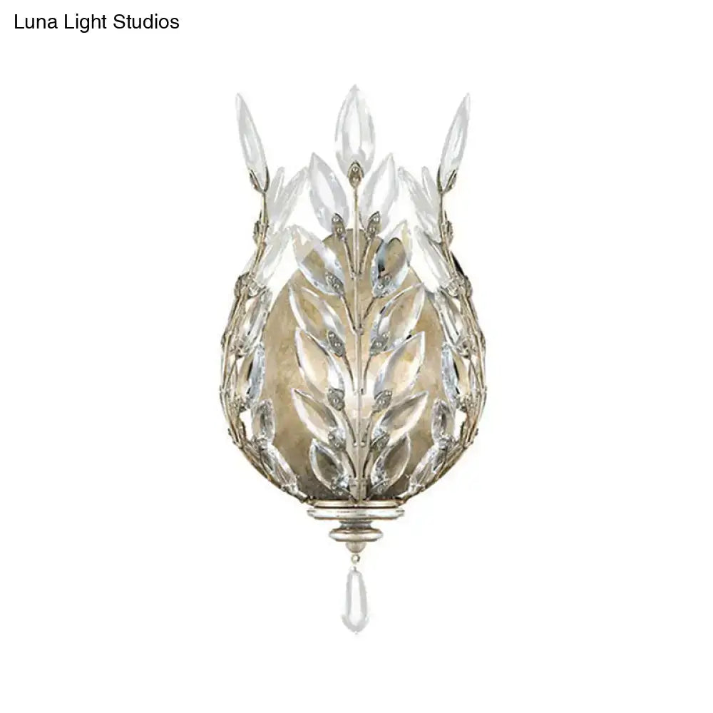 Brass crystal single drop wall light with leaf-shaped prisms and hanging teardrop by Decorbites on Tampa Home & Garden Store