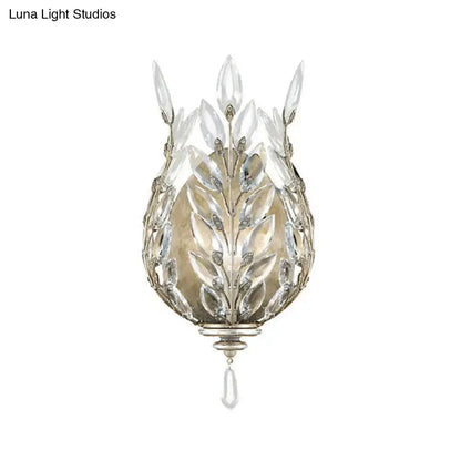 Brass crystal single drop wall light with leaf-shaped prisms and hanging teardrop by Decorbites on Tampa Home & Garden Store