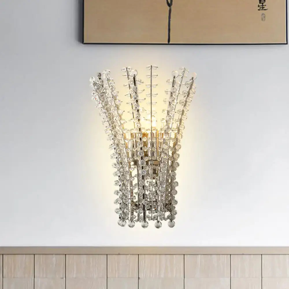 Silver crystal wall sconce by Decorbites with hanging crystal strands, chrome finish on Tampa Home & Garden Store