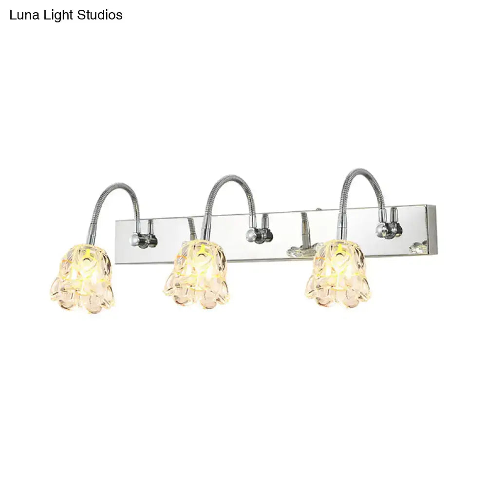 Decorbites vanity light with silver crystal shades and three gooseneck arms on chrome bar on Tampa Home & Garden Store