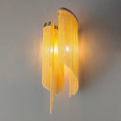 Silver Crystal Tassel Wall Light with crystal bead tassels and warm amber glow on Tampa Home & Garden Store