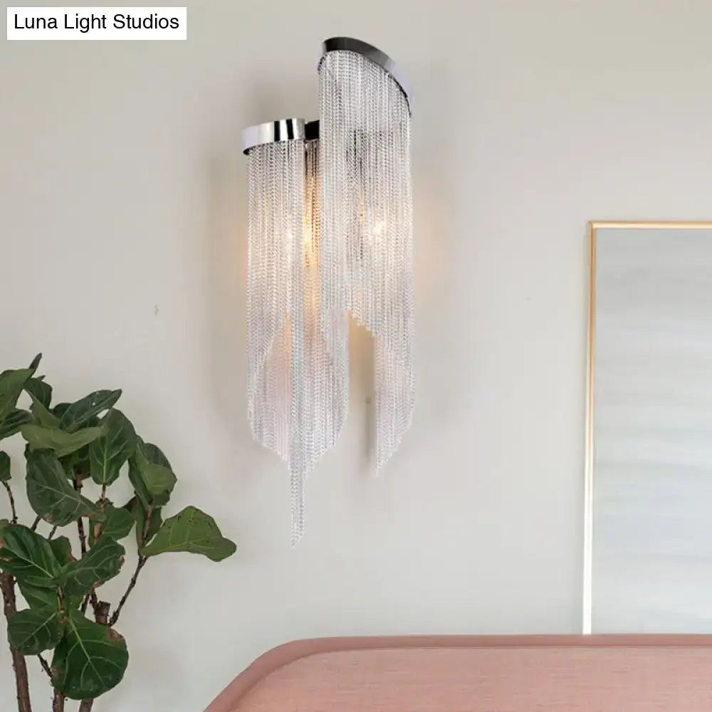 Silver crystal tassel wall light with cascading bead strands, chrome backplate Decorbites on Tampa Home & Garden Store