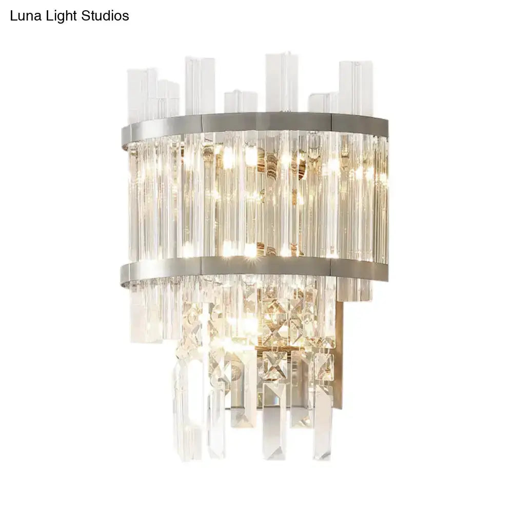 Modern silver crystal tiered wall light fixture with hanging prisms and chrome bands on Tampa Home & Garden Store