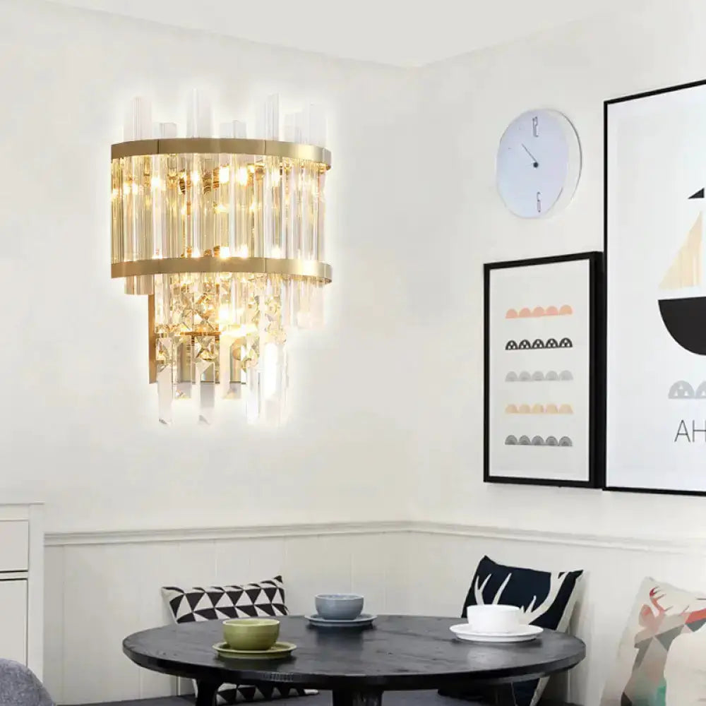 Modern silver crystal tiered wall-mounted dining room light by Decorbites, gold bands and hanging prisms on Tampa Home & Garden Store