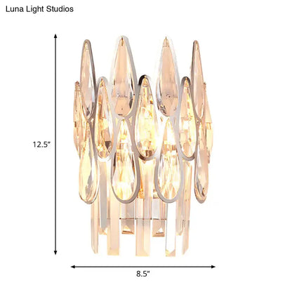 Silver double crystal wall sconce with hanging teardrop prisms on Tampa Home & Garden Store