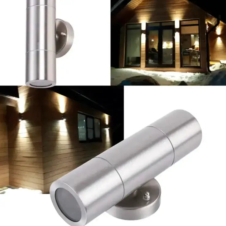 Two modern silver cylindrical outdoor wall sconces for minimalist exterior lighting on Tampa Home & Garden Store