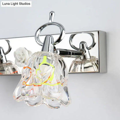 Decorbites Silver Glass Flower Light wall sconce with clear glass petals and chrome mount on Tampa Home & Garden Store