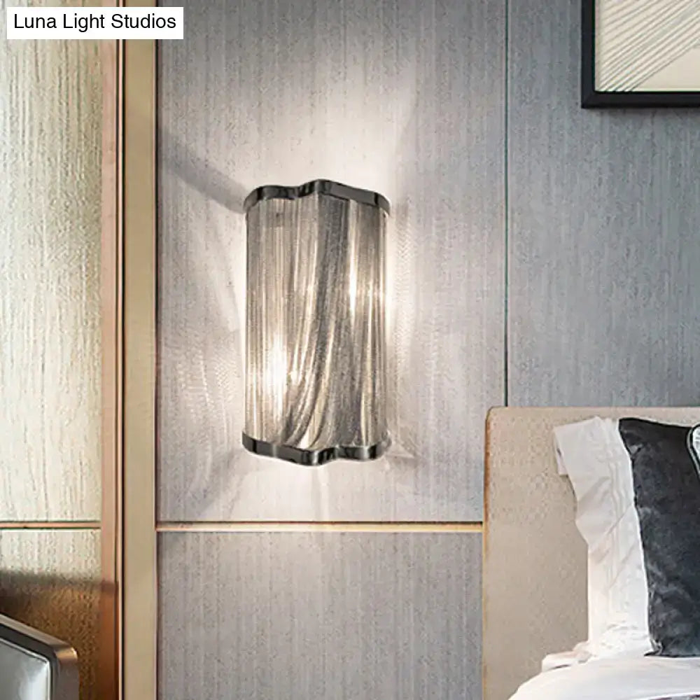 Silver tassel aluminum wall light sconce with ribbed glass shade by Decorbites on Tampa Home & Garden Store