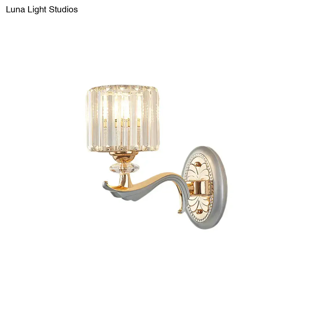 Decorbites silver crystal wall sconce, 1-2 light, with gold curved arm and faceted shade on Tampa Home & Garden Store