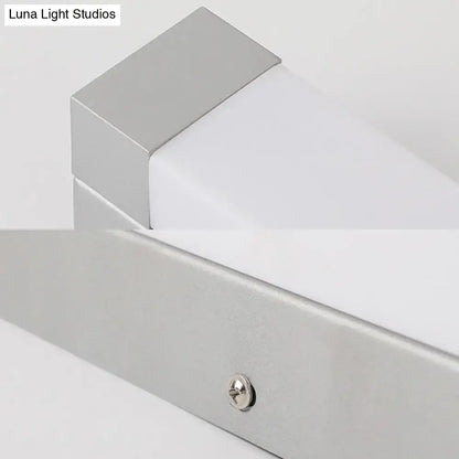 Modern silver LED bathroom vanity light with acrylic shade, sleek metal block design on Tampa Home & Garden Store