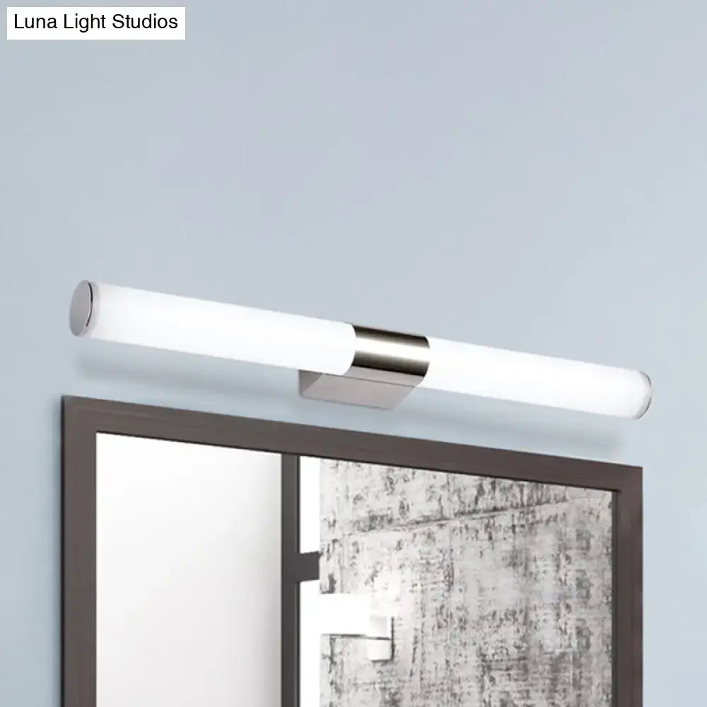 Chrome LED wall sconce with frosted acrylic tube and metal mounting bracket on wall on Tampa Home & Garden Store