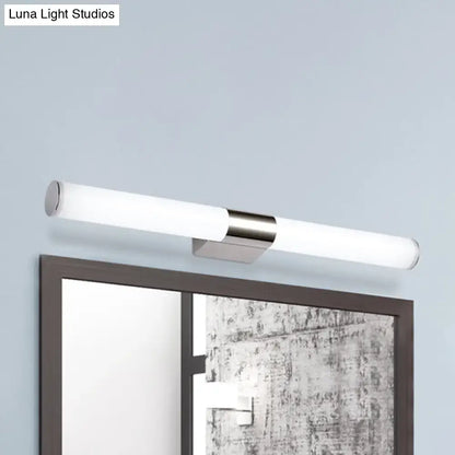 Chrome LED wall sconce with frosted acrylic tube and metal mounting bracket on wall on Tampa Home & Garden Store