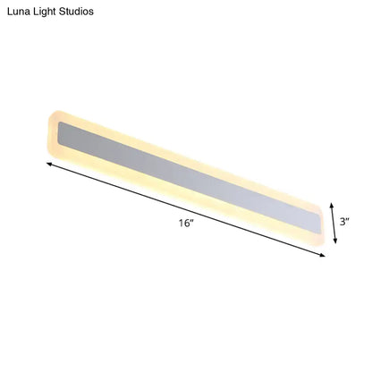 Silver Elongated Wall Light by Decorbites, gray center panel, 16in long, warm glow on Tampa Home & Garden Store
