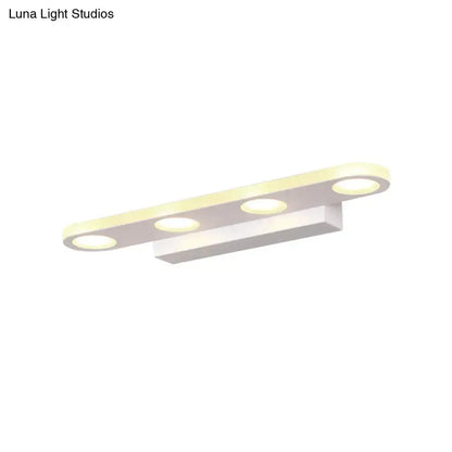 Silver oblong LED wall light bar by Decorbites with four LEDs on Tampa Home & Garden Store